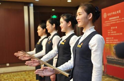 微笑點亮盛會 巾幗盡展風華——記北京國際會議中心接待服務組的姑娘們